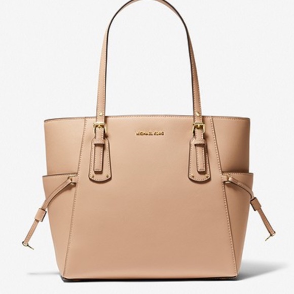 Michael Kors Voyager Saffiano Leather Tote Bag
Style#30H1GV6T4T
NWT
OYSTER - Picture 2 of 16